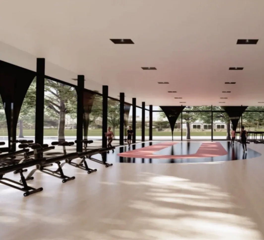 Perspectiva de academia com fachada envidraçada e vista para o parque